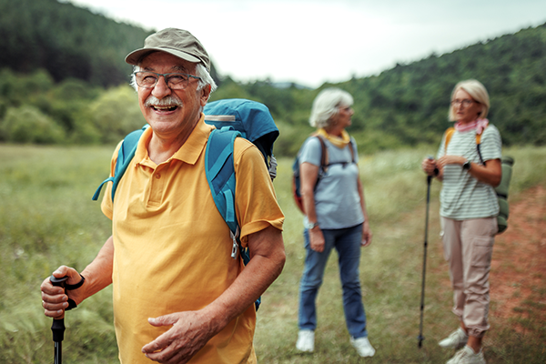 2604_STOCK_Homepage Header_April_Older adults hiking in late spring_SMALL