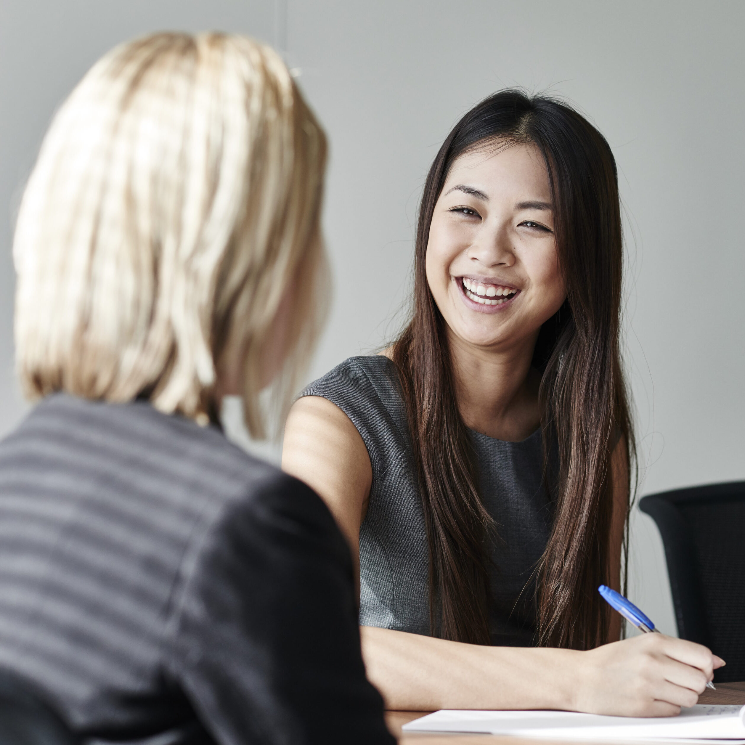 A case manager meets individually with a client.