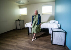 Sandy in a room similar to where her son was housed in the MENTAL HEALTH CENTER OF DENVER located at 2929 W 10th Ave, Denver, CO 80204. Photos by Evan Semón Photography  
720-620-6767